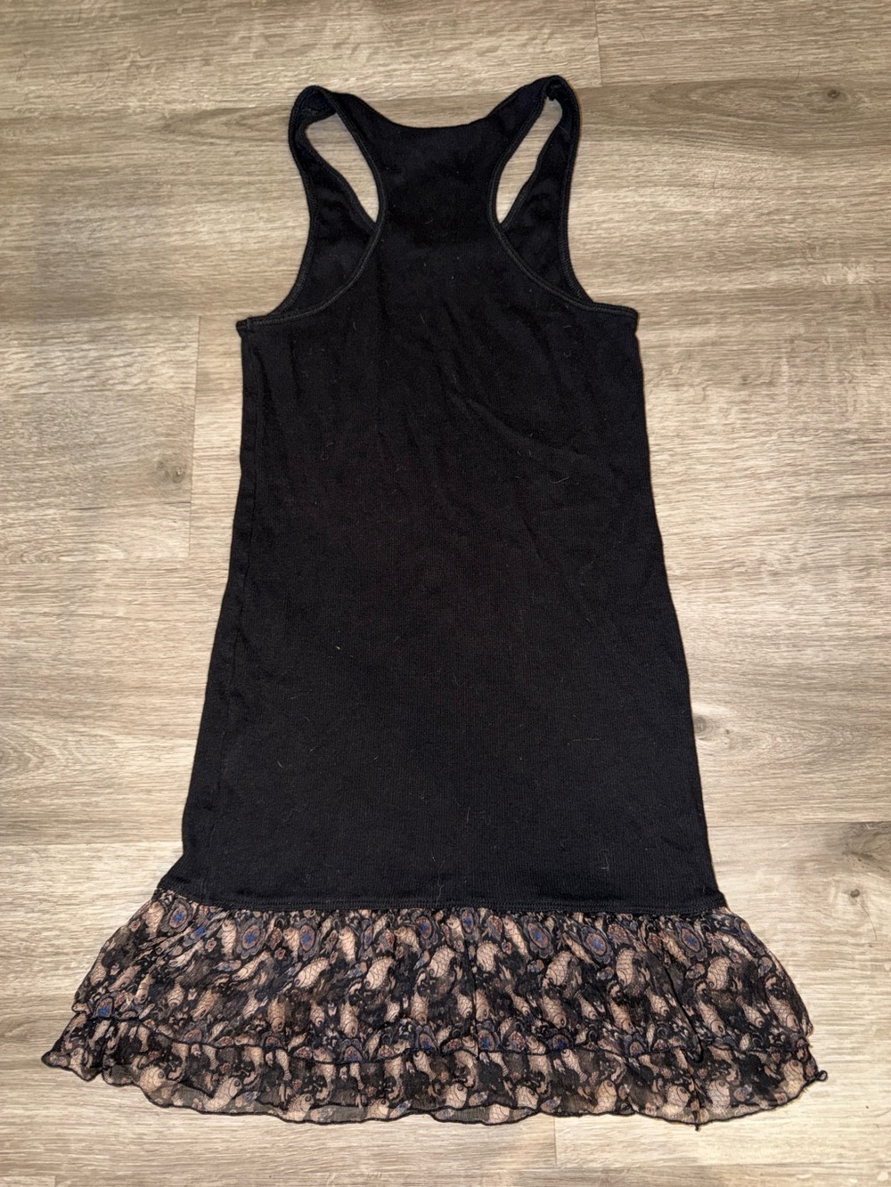 Women’s Black Racerback Tank Top with Ruffled Hem